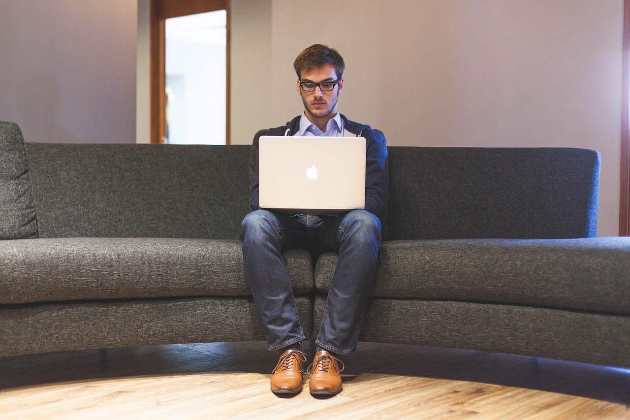 Man, laptop, businessman — Enhance Trade Protection with Intelligent Risk Management Indicators for MT4